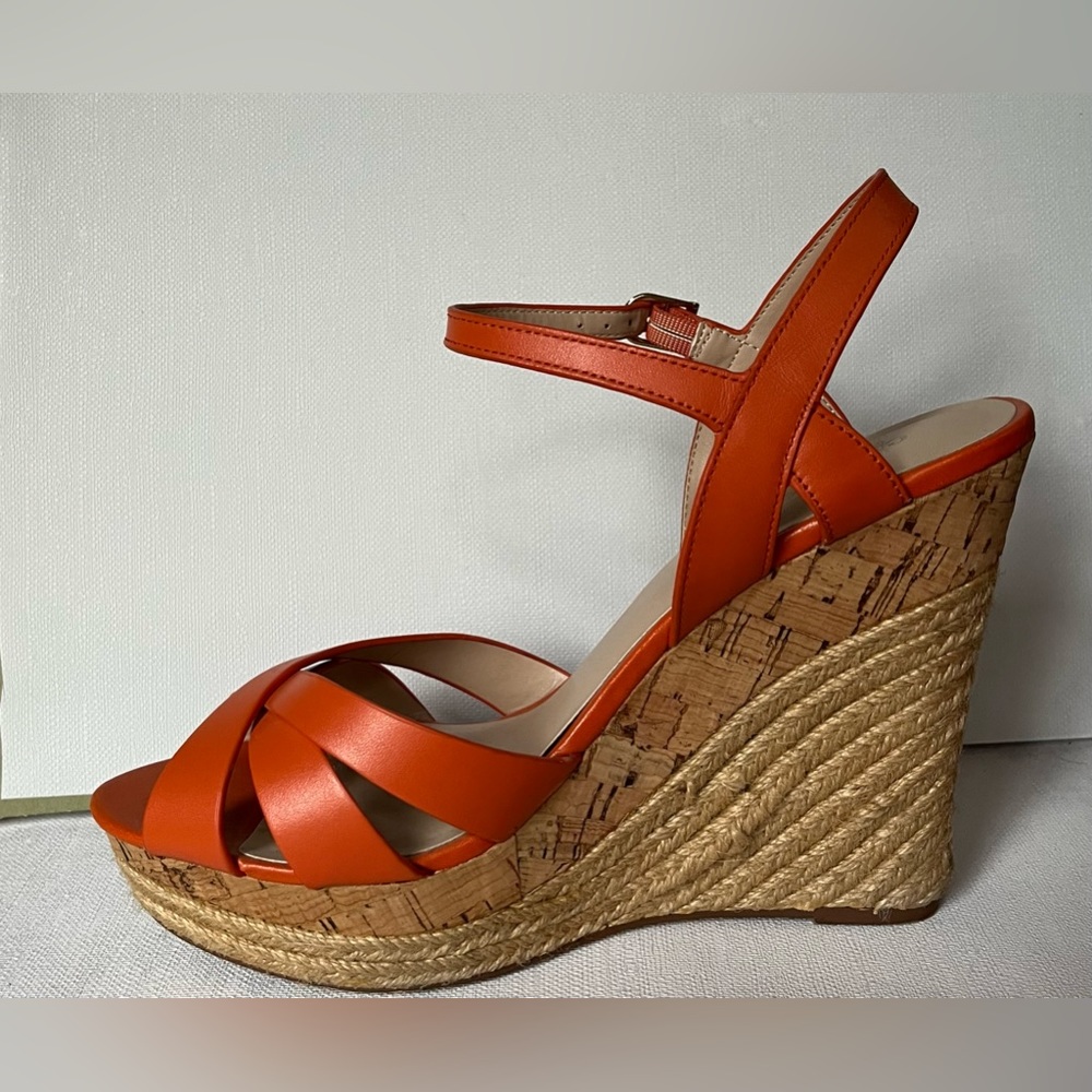 Orange, leather, cork wedge. Excellent condition.